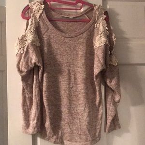 Sweater with lace detail.